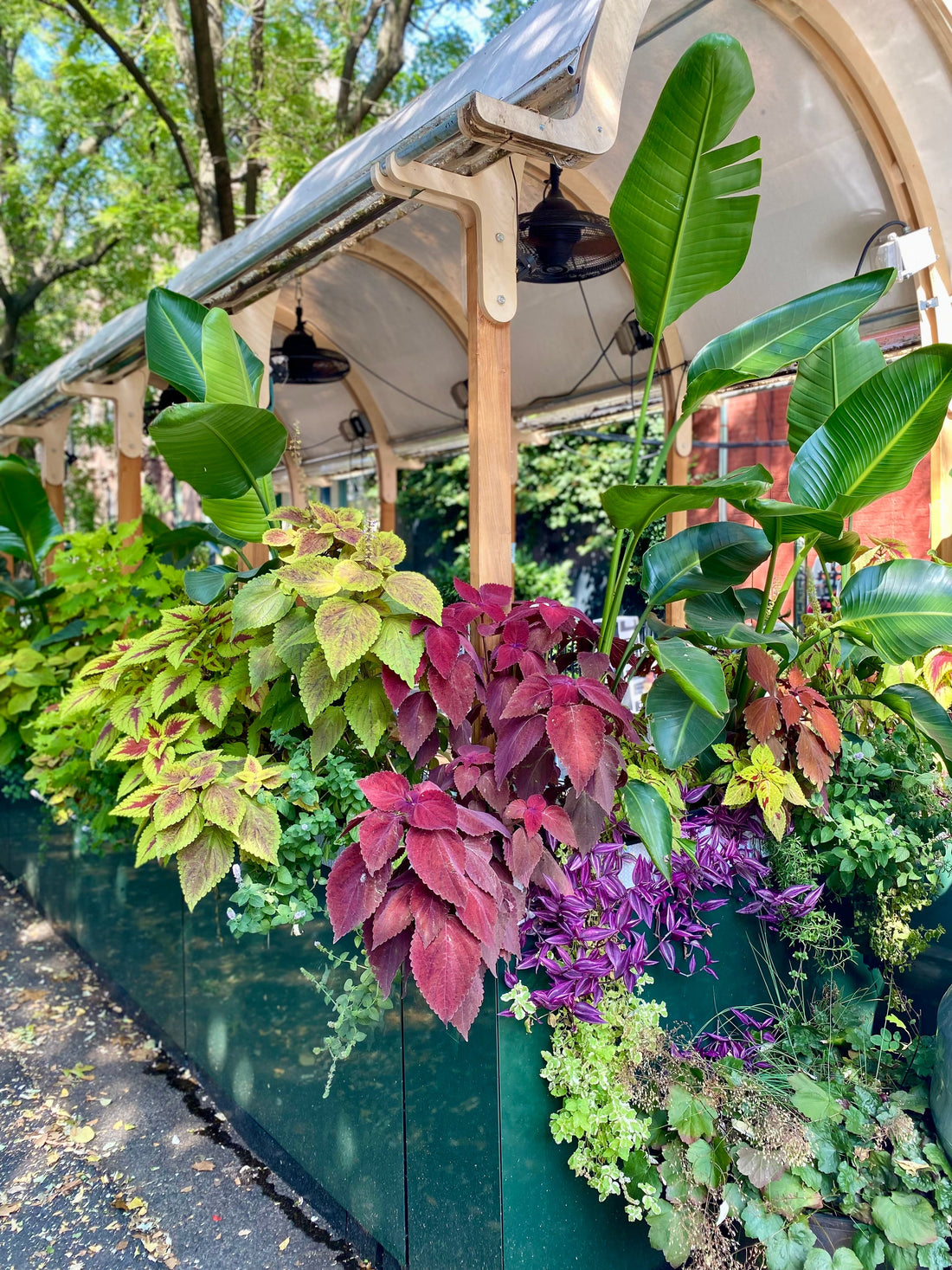 NYC seasonal outdoor dining structure by Re-ply - Olea